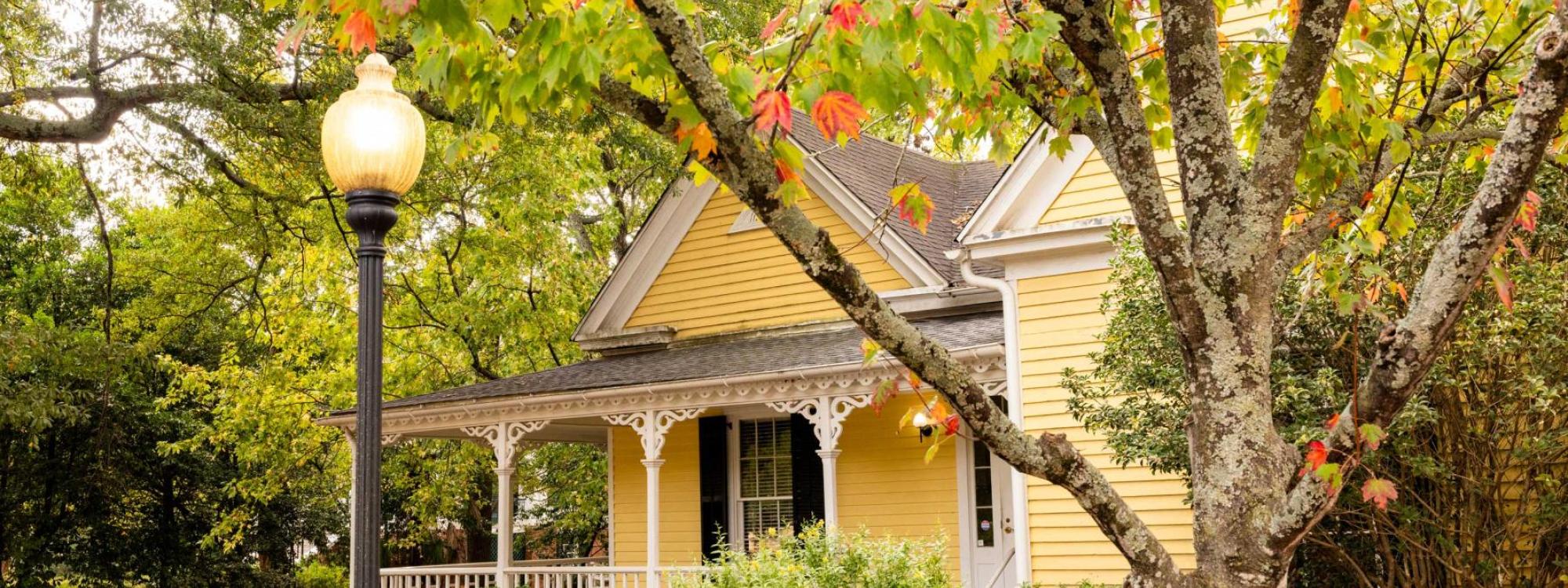 Yellow house that houses Latin American and Caribbean Studies at UGA